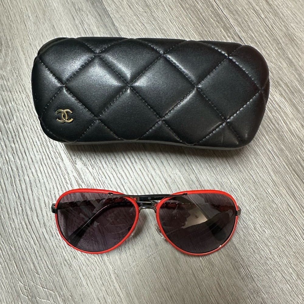 Chanel Black Quilted Sunglasses Case with Red Aviator Sunglasses.
